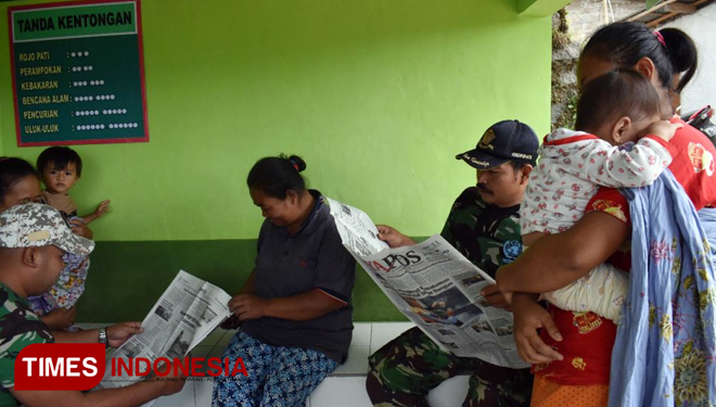 Tanda-tanda kentongan terlihat terpampang di Poskamling