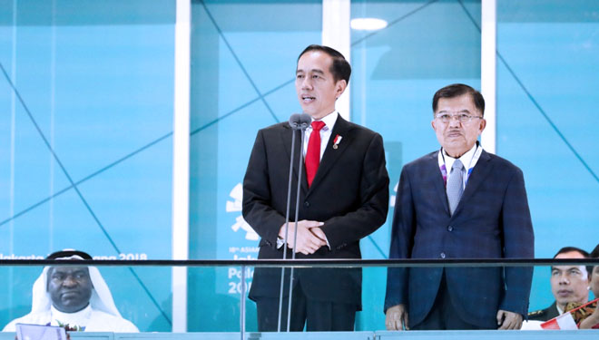 President Joko Widodo (left) with Vice President Jusuf Kalla (right) when giving a speech at the Opening Ceremony of the 18th Asian Games in 2018 at the Bung Karno Main Stadium, Senayan, Jakarta, Saturday (8/18). (PHOTO: INASGOC / Dhoni Setiawan)