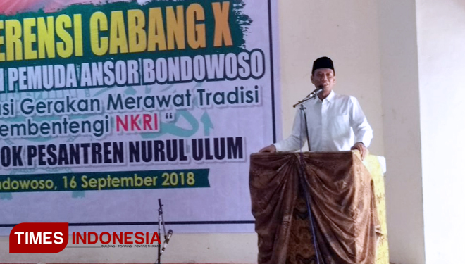 ASH (Amin Said Husni) saat menyampaikan sambutan sekaligus membuka Konfercab GP Ansor Bondowoso (FOTO: Moh Bahri/TIMES Indonesia)