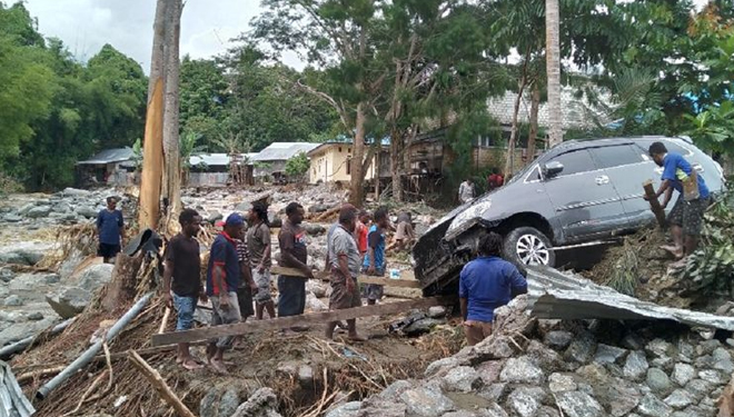 Kondisi banjir bandang di Sentani, Jayapura, Papua. (KOMPAS.com/DHIAS SUWANDI)