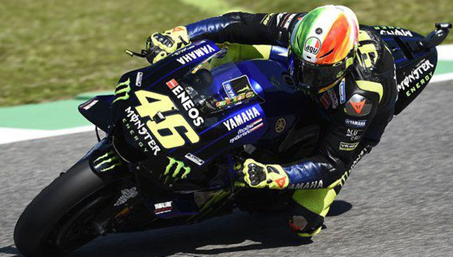 Valentino Rossi dalam sebuah manuver bersama motor tunggangannya. (Ilustrasi) 