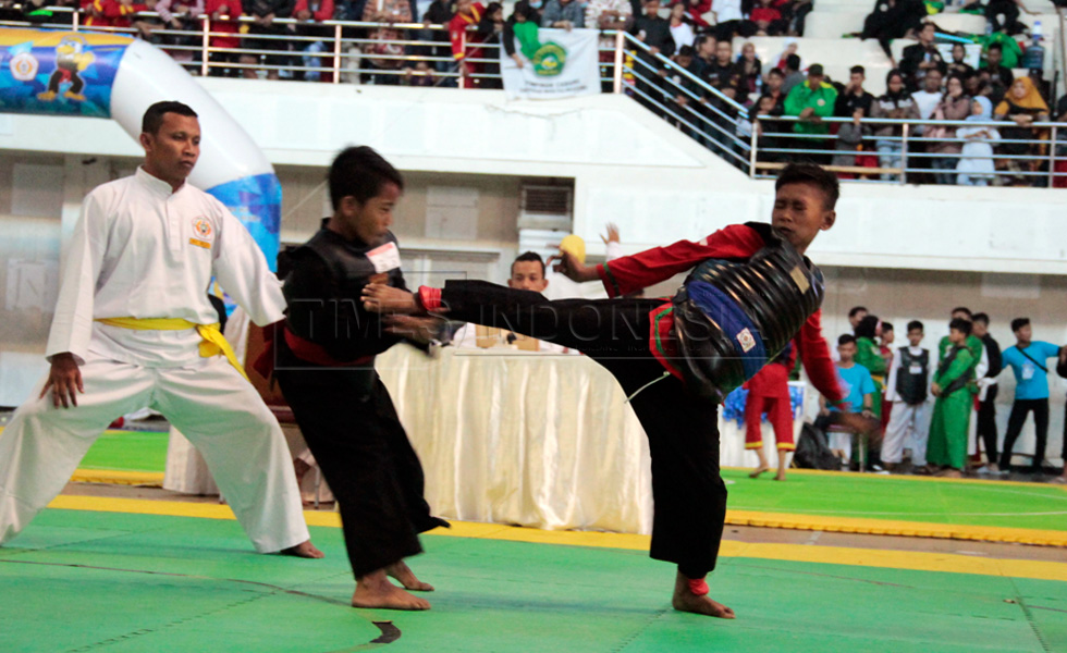 Bermain ngotot para peserta Malang Championship I kategori tanding. (Foto : Tria Adha/TIMES Indonesia)