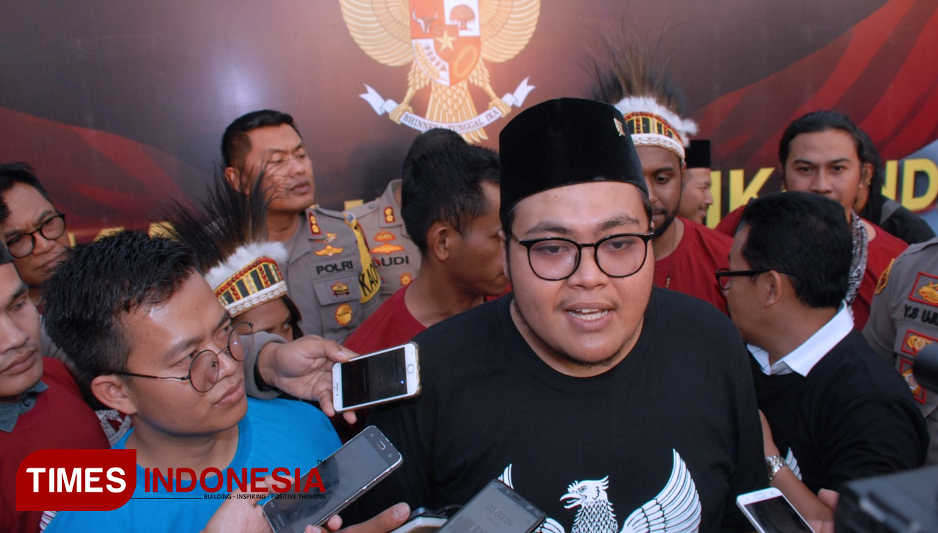 Ketua GMNI Malang Raya, Rachmat Arief Budiman, di Simpang Balapan, Jumat (23/8/2019). (FOTO: Adhitya Hendra/TIMES Indonesia)