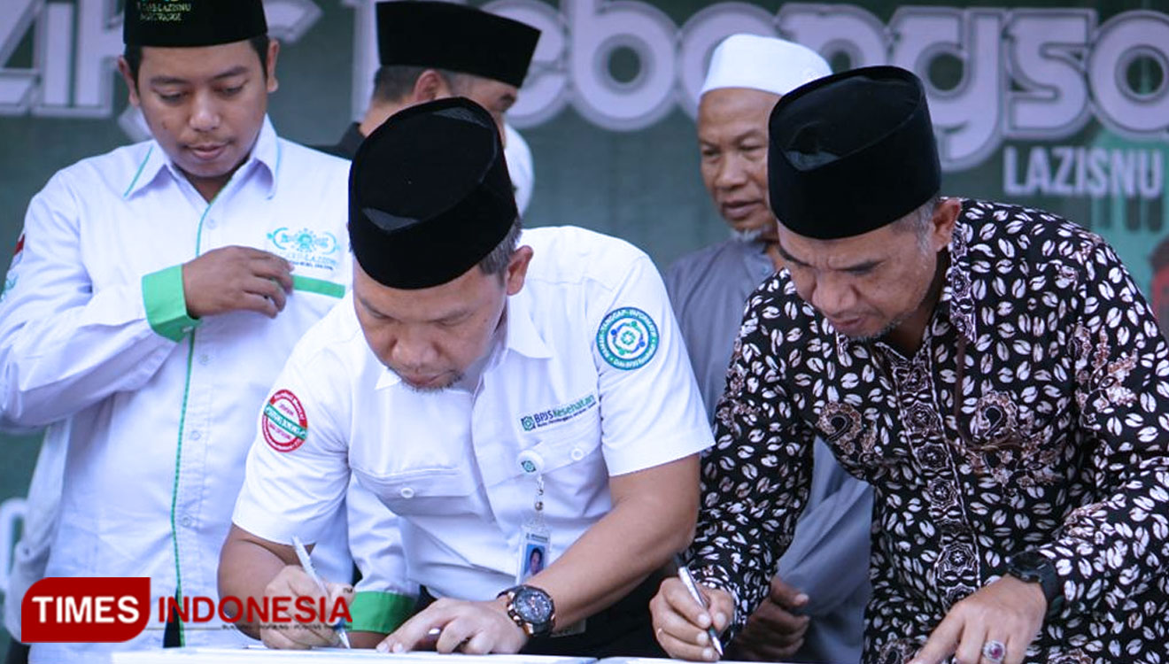 BPJS Kesehatan teken nota kesepahaman bersama dengan NU Care LAZIZNU Banyuwangi. (Foto: Roghib Mabrur/TIMES Indonesia)