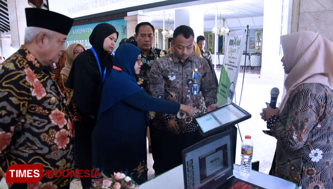 Plt Bupati Malang, Drs HM Sanusi MM saat mendampingi tim validasi dalam melakukan penilaian. (Foto : Humas Pemkab Malang untuk TIMES Indonesia)