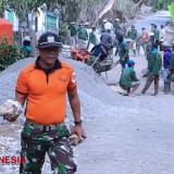 Tim Kes TMMD Kodim Malang-Batu Bantu Giat Rabat Jalan Yang Semakin Jauh