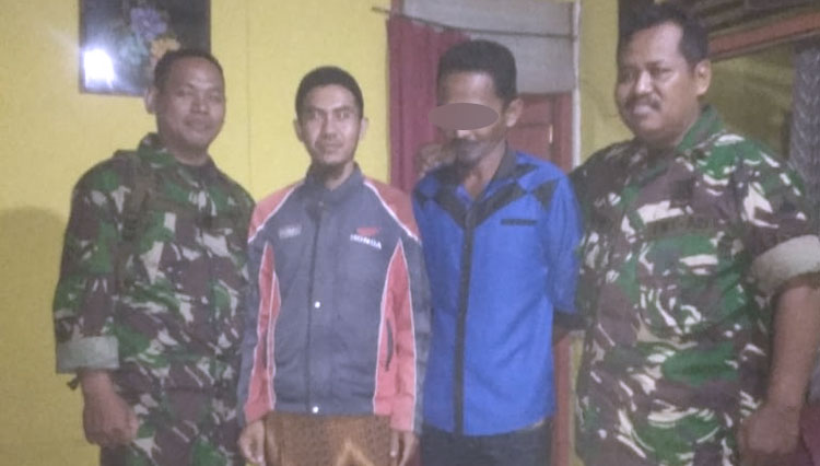 Alias saat ditangkap dan diamankan Babinsa Jenang, Sertu Slamet. (FOTO: Pendim Cilacap/TIMES Indonesia)