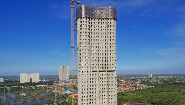 Berdiri kokoh. Olive Tower Grand Dharmahusada Lagoon serah terima akhir tahun ini. (Foto: Dok. PP Properti)