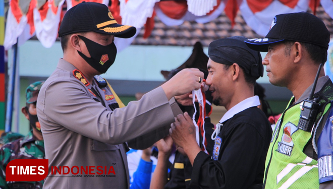 Suasana launching gerakan Jatim Bermasker di Kabupaten Madiun. (Foto: Humas Polres Madiun/TIMES Indonesia)