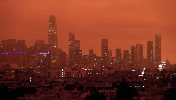 Asap mengubah langit San Fransisco, California menjadi kuning seperti senja. (Foto: Reuters via BBC)