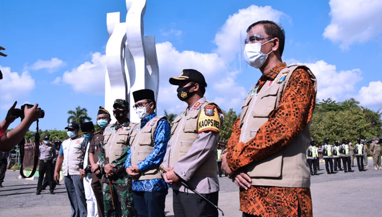 Apel Gelar Pasukan Ops Yustisi Tahun 2020 di lapangan monumen arek Lancor Kabupaten Pamekasan. (Foto: Akhmad Syafi'i/TIMES Indonesia)
