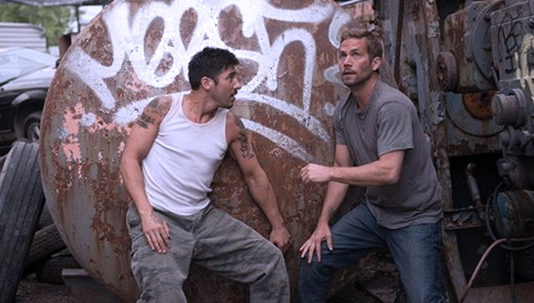 Salah satu scene Paul Walker di film Brick Mansions. (FOTO: tirto)