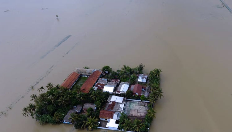 Kondisi banjir di Kemranjen. (FOTO: Parsito for TIMES Indonesia)