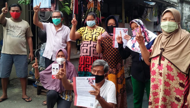Surat Risma diterima warga Surabaya jelang hari H pencoblosan Pilkada Serentak 2020. (FOTO: PDI Perjuangan for TIMES Indonesia)