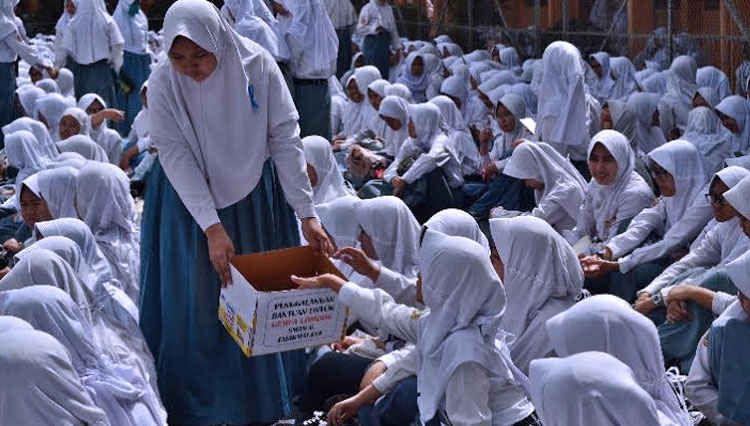 Ilustrasi - Siswi Non Muslim berjilbab. (FOTO: ANTARA)