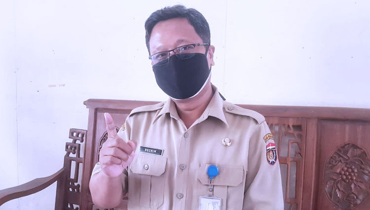 Rochimin Kepala Bidang Perdagangan Disperindag Kabupaten Ngawi saat memberikan keterangan. (Foto: M. Miftakul/TIMES Indonesia)