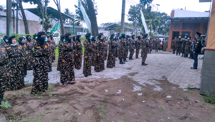 Ketua GP Ansor Kabupaten Malang Husnul Hakim Syadad MH saat memimpin Apel Kesetiaan Denwaster. (Foto: GP Ansor Kabupaten Malang)