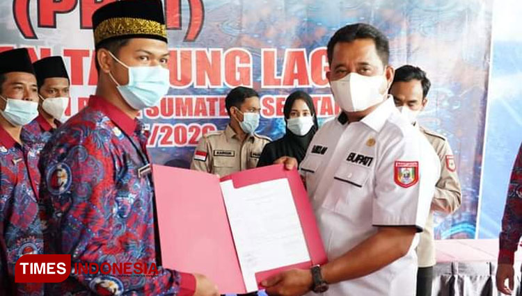 Bupati Banyuasin Askolani saat hadir di pengukuhan PPDI. (Foto: Zuhri for TIMES Indonesia)