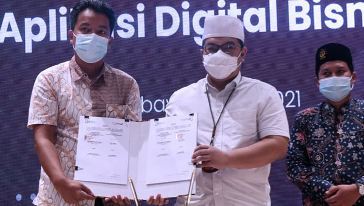 Perjanjian Kerja Sama (PKS) dengan PT Teknologi Kartu Indonesia dan PT Sidogiri Pandu Utama dalam hal aplikasi digital bisnis dan layanan virtual account bankjatim pada aplikasi E-Maal, Senin (5/4/2021).(foto: Dok.Bank Jatim)