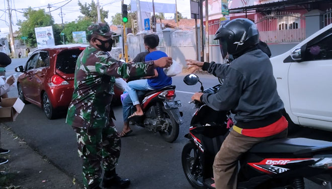 Kegiatan guna melatih anggota memiliki rasa kepedulian terhadap lingkungan dan sesama atau masyarakat yang kurang mampu. (FOTO: Pendim Cilacap for TIMES Indonesia)