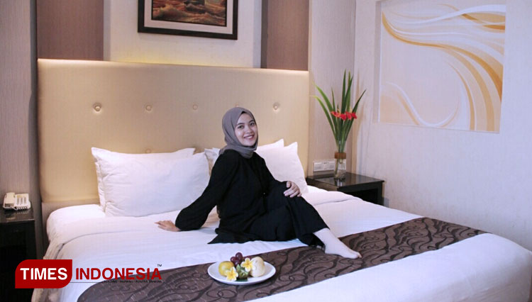 Suasana hangat kamar hotel Aria Gajayana Malang. (FOTO: Rofiul Achsan/TIMES Indonesia) 