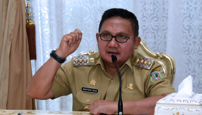 Wali Kota Gorontalo, Marten Taha saat mengikuti rapat koordinasi dan evaluasi penyerapan anggaran triwulan II Kota Gorontalo tahun 2021 (Foto: Humas Pemkot Gorontalo)