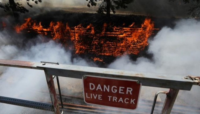 Angin kencang dan kering, cuaca panas menyebabkan puluhan area hutan terbakar serta  menghanguskan bentangan luas Oregon, California dan negara bagian barat lainnya.(FOTO: Reuters)