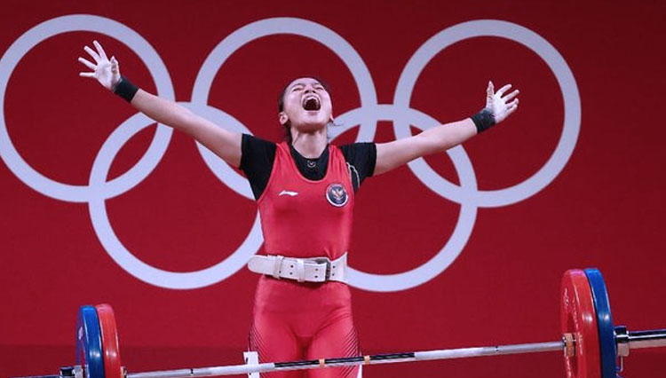 Windy ketika berhasil melakukan clean and jerk pada 49 kilogram putri Olimpiade Tokyo 2020. (REUTERS/EDGARD GARRIDO)