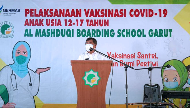 Bupati Garut, Rudy Gunawan, memberikan sambutan dalam acara vaksinasi anak usia 12-17 tahun di Al-Mashduqi Boarding School yang berlokasi di Jalan KH. Mashduqi No. 67, Kecamatan Tarogong Kaler, Kabupaten Garut, Rabu (4/8/2021).(Foto :Diskominfo Garut/Time