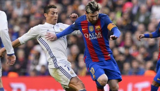 Lionel Messi dan Cristiano Ronaldo saat di Liga Spanyol. (FOTO: AFP)