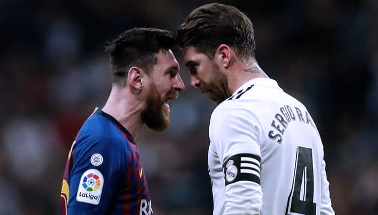 Sergio Ramos saat bertikai dengan Lionel Messi di laga El clasico. (FOTO: Getty Images)
