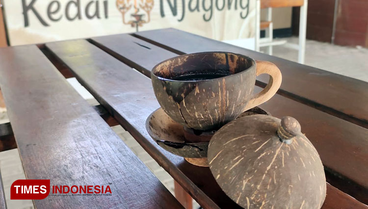 The exotic look of Kopi Degan served on coconut shell at Kedai Njagong Lamongan, East Java. (Photo: Moch. Nuril Huda/TIMES Indonesia)