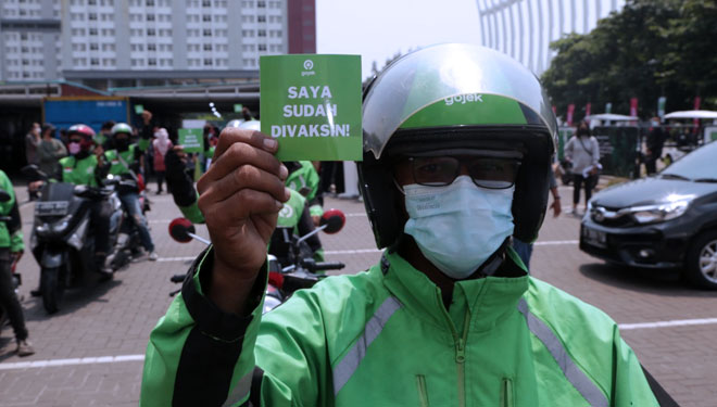 Driver Gojek yang telah divaksin. (Foto: dok. Gojek Indonesia). 