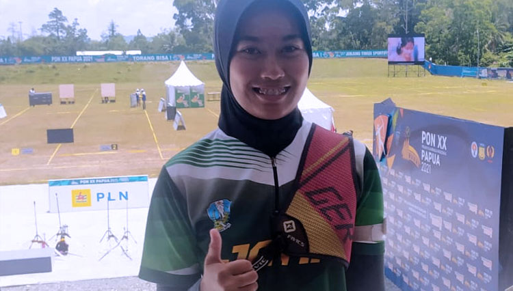Bunga Arbela, atlet panahan putri Kabupaten Malang yang tergabung bersama tim panahan Jawa Timur berhasil meraih medali emas pada PON XX Papua. (FOTO: KONI Kabupaten Malang).